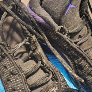 Purple and black jordans size 1y